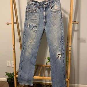 Vintage 80s 90s thrashed light wash Levi’s jeans 32